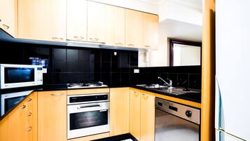 Three Bedroom Penthouse (PQ4S) | Private kitchen | Fridge, microwave, stovetop, electric kettle