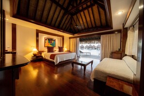 Bungalow, cạnh bãi biển | Bộ đồ giường cao cấp, minibar, két bảo mật tại phòng, bàn 