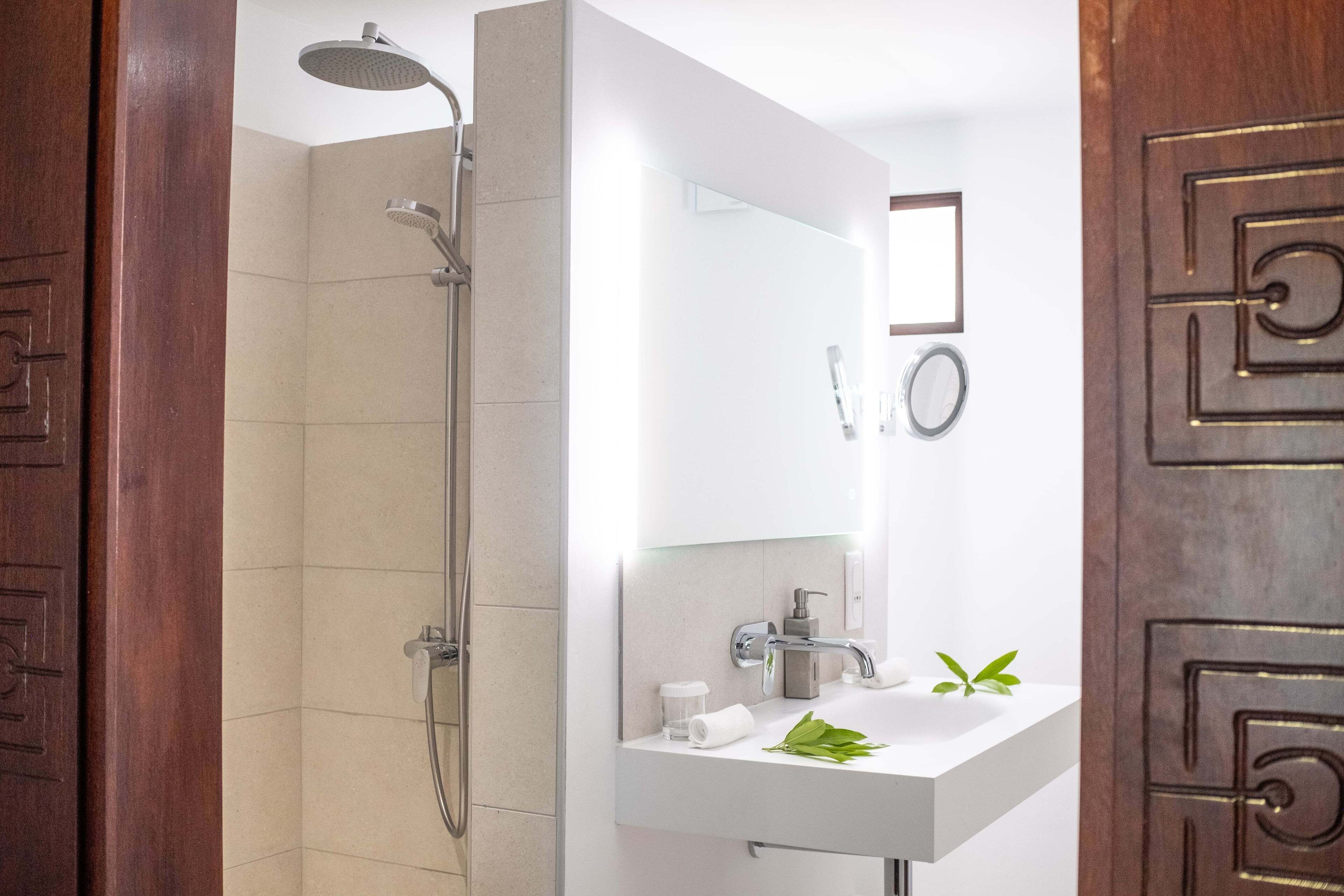 designer toiletries, hair dryer, bathrobes, towels