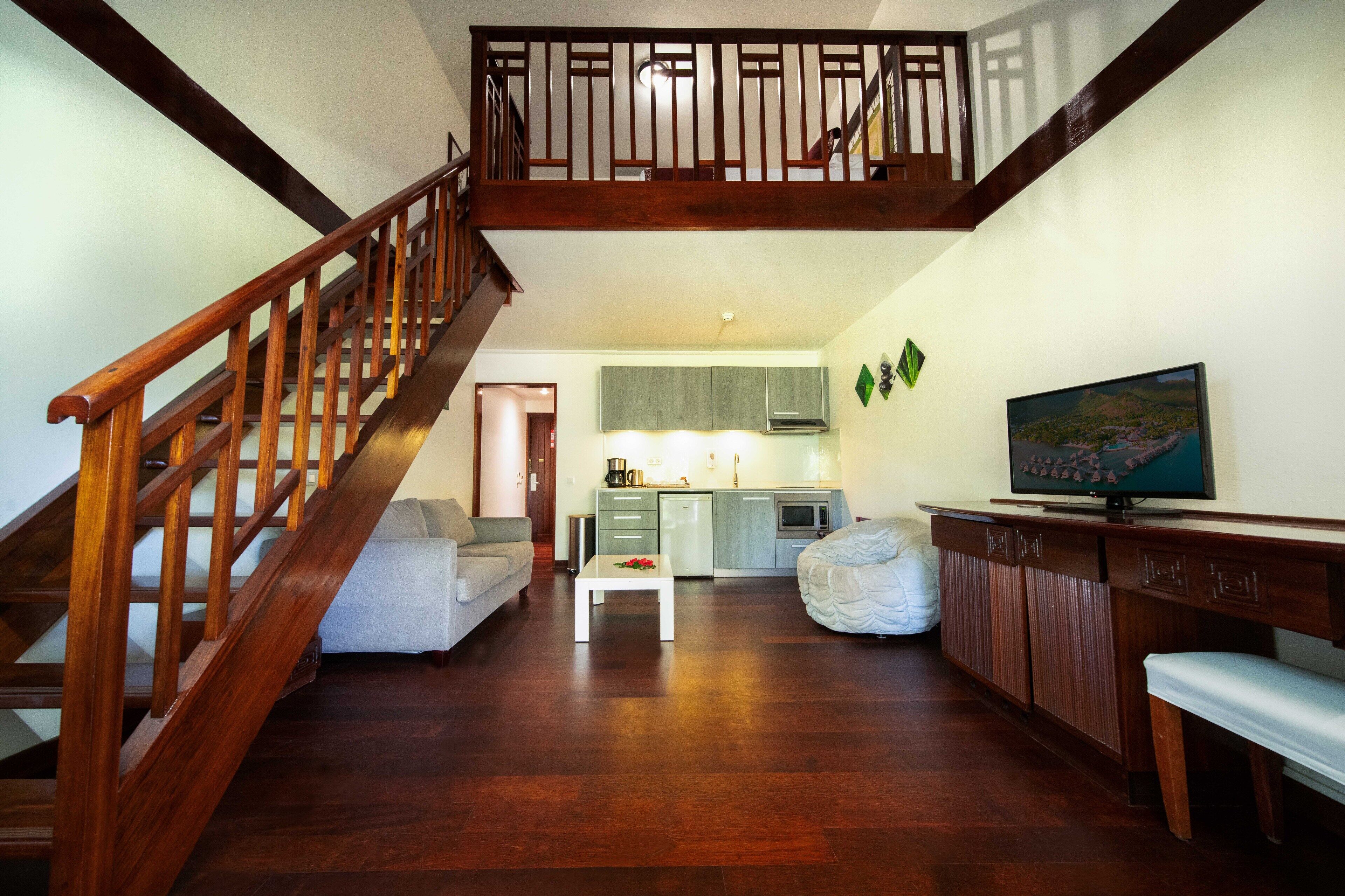 garden duplex with kitchenette | living area | 26-inch lcd tv with satellite channels, tv, dvd player