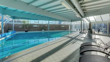 Indoor pool, open 7:00 AM to 9:00 PM, pool loungers