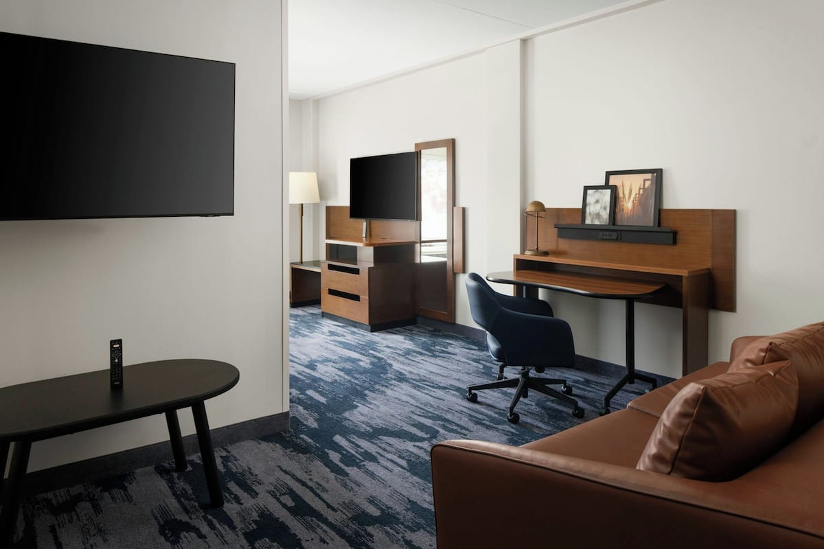 Suite ejecutiva, 1 habitación | Escritorio, espacio para trabajar con laptop y cortinas blackout