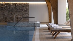A swimming pool with a stone wall, wooden beams, and lounge chairs with towels. - Loch Fyne Hotel And Spa (Inveraray)