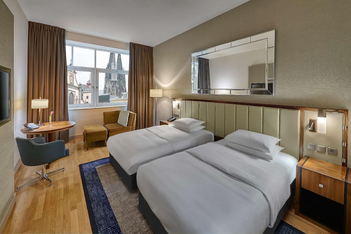 Premium bedding, memory foam beds, minibar, in-room safe