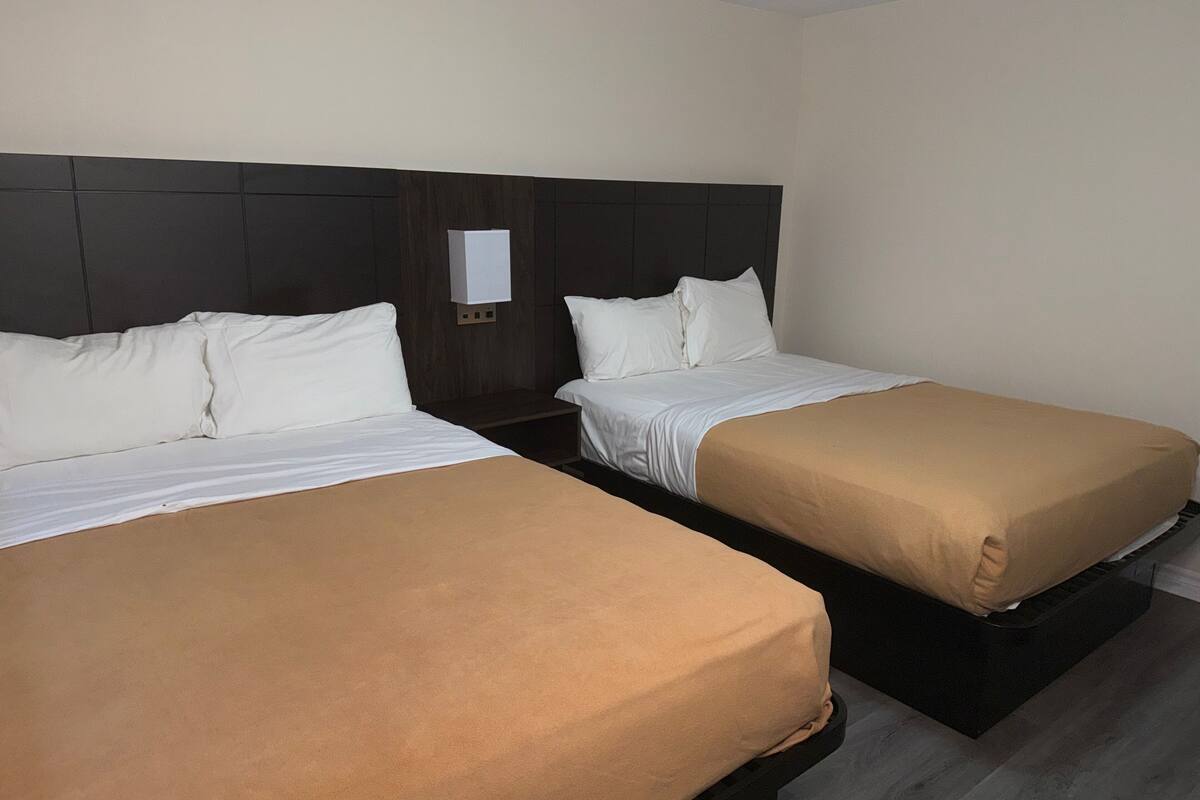 Room, 2 Queen Beds, Smoking | Desk, iron/ironing board, free cots/infant beds, rollaway beds