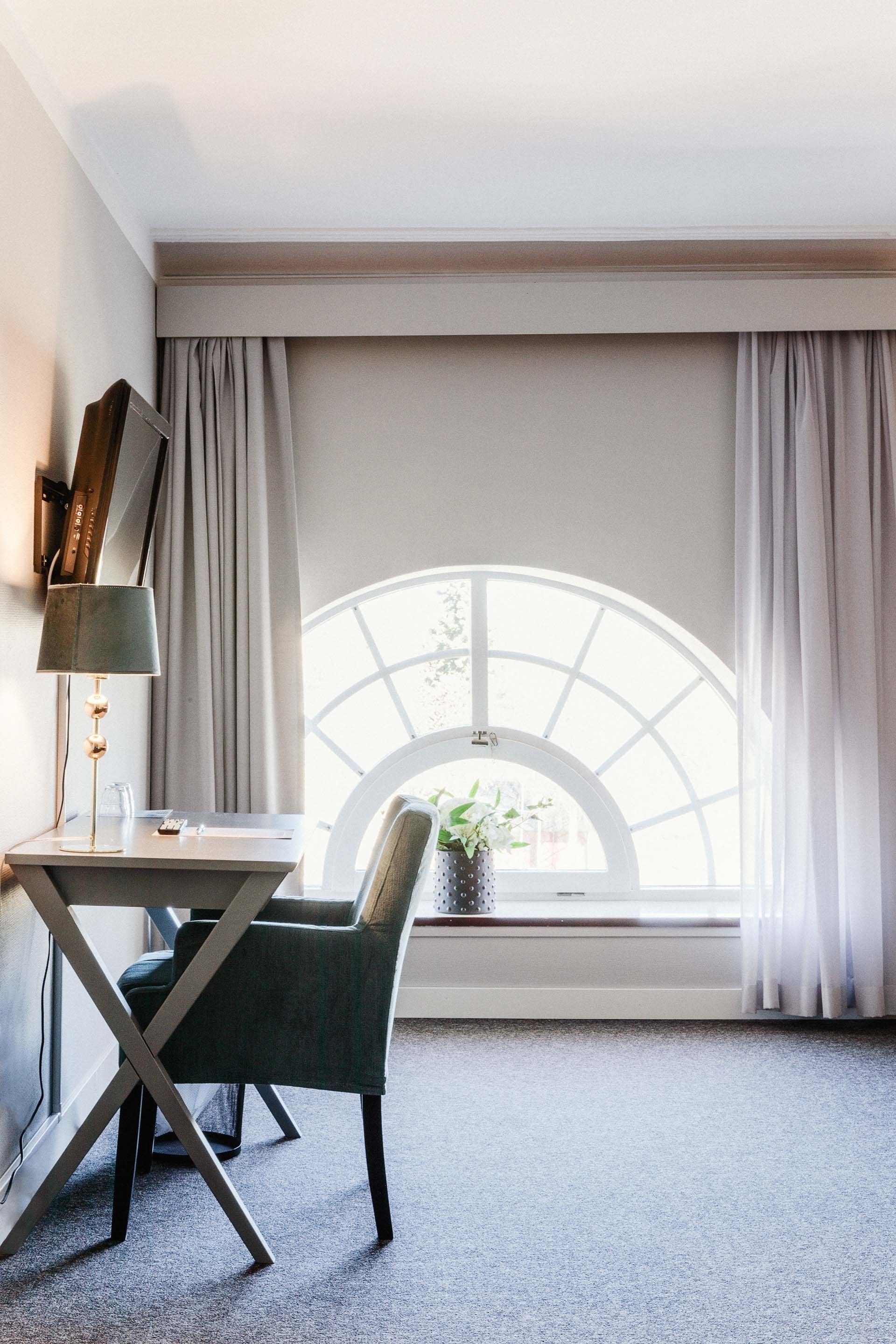 suite | individually furnished, desk, blackout curtains, free wifi