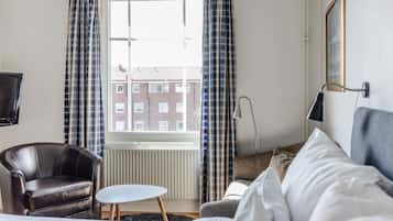 Family Room | Individually furnished, desk, blackout drapes, free WiFi