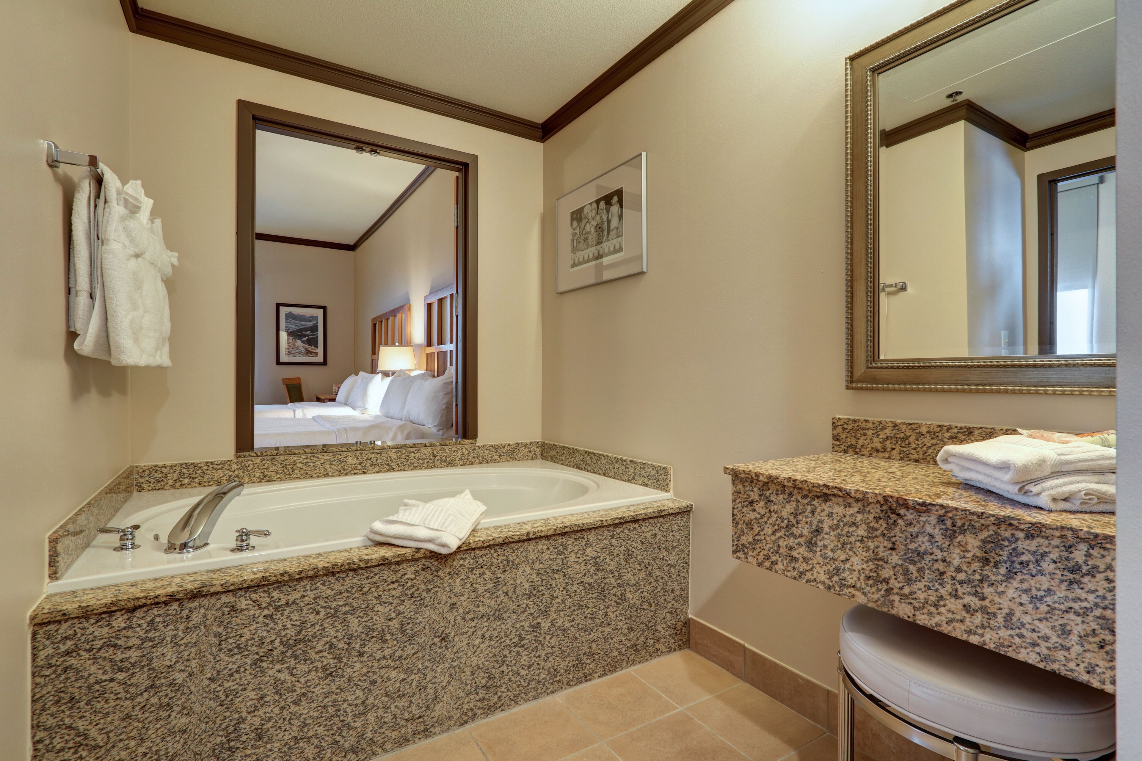 separate bathtub and shower, deep-soaking bathtub, designer toiletries