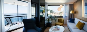 Executive Suite, Balcony, Sea View | Living area | Plasma TV, pay films