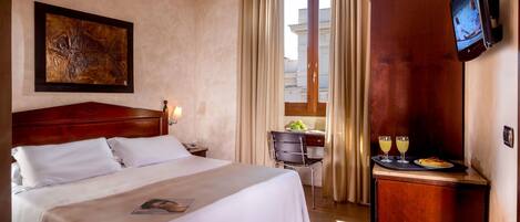 Down duvets, minibar, in-room safe, desk