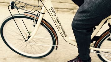A close-up of a bicycle with the text "HOTEL SAN FRANCISCO" on the frame.