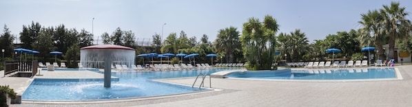Outdoor pool, open 9:30 AM to 7:30 PM, pool umbrellas, pool loungers