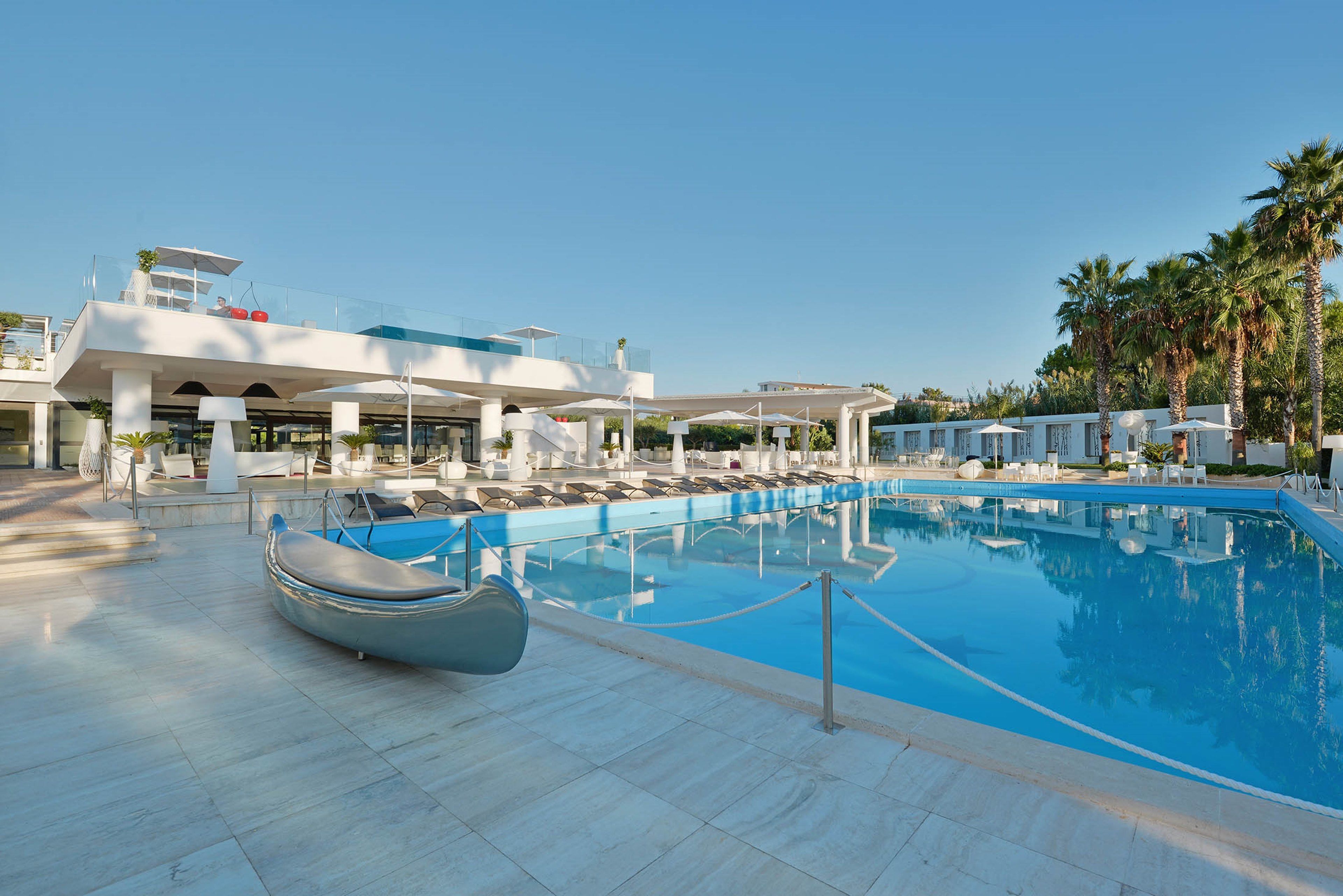 2 outdoor pools, pool umbrellas, pool loungers