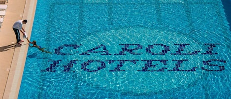2 outdoor pools, pool umbrellas, pool loungers