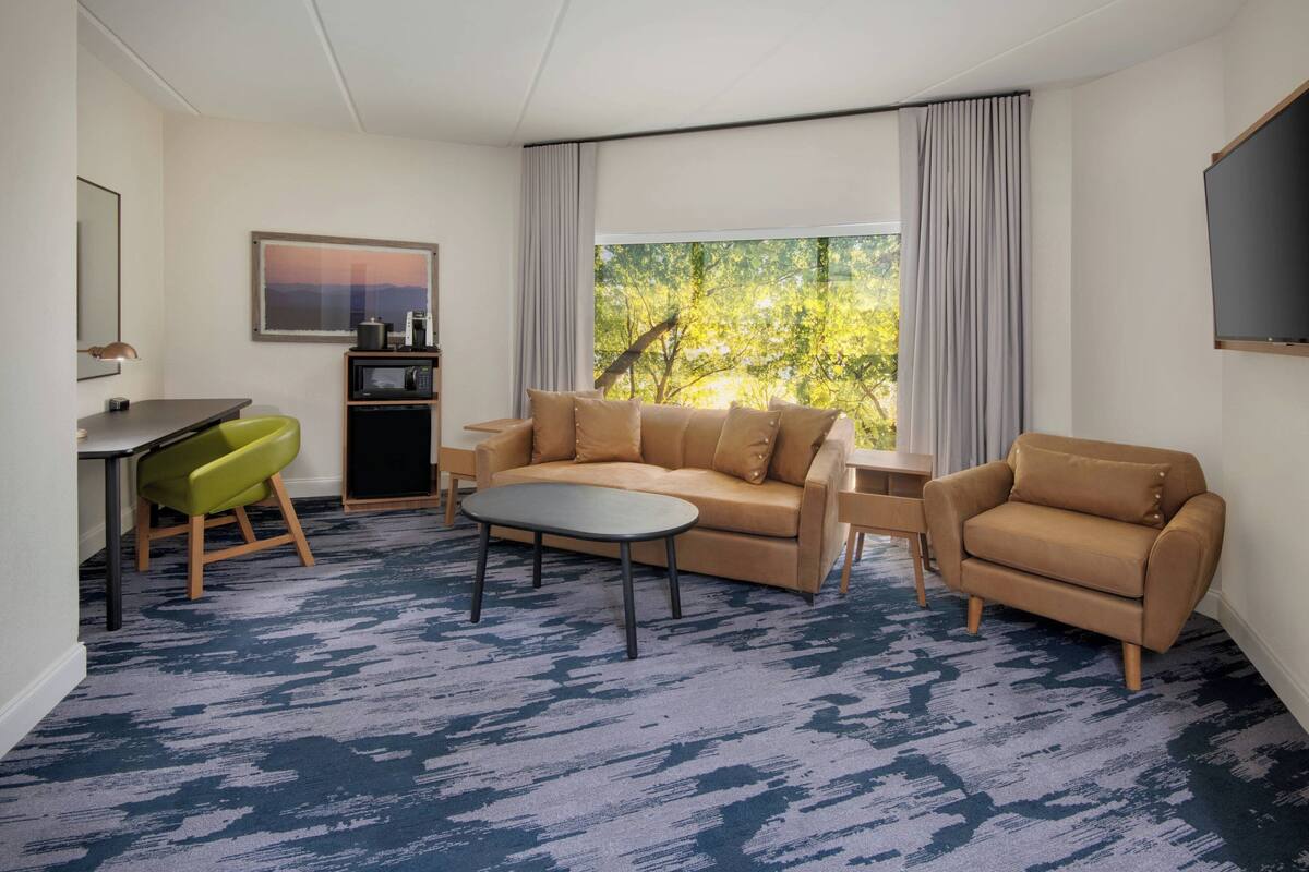 desk, blackout curtains, iron/ironing board, free cots/infant beds