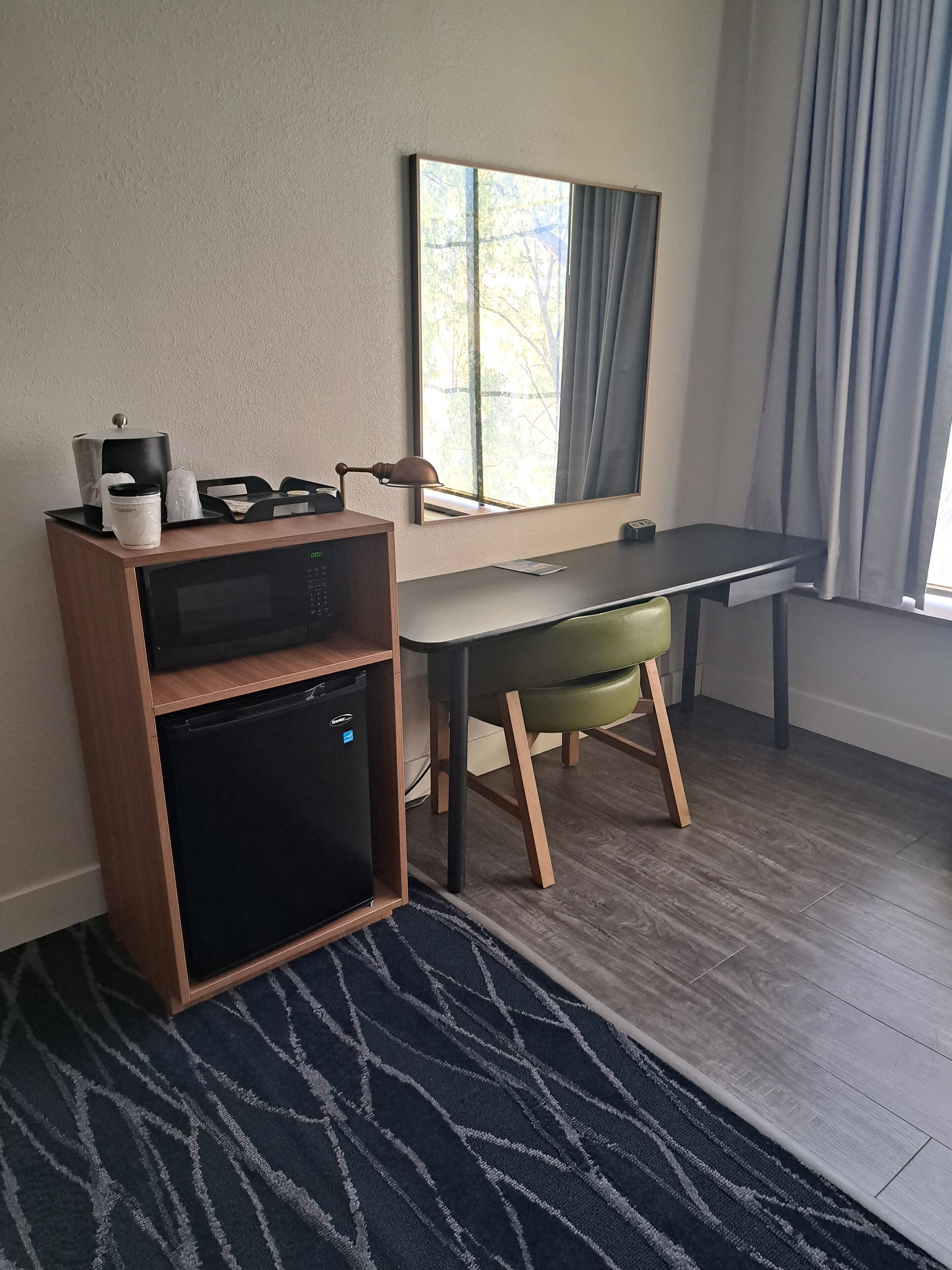 desk, blackout curtains, iron/ironing board, free cots/infant beds