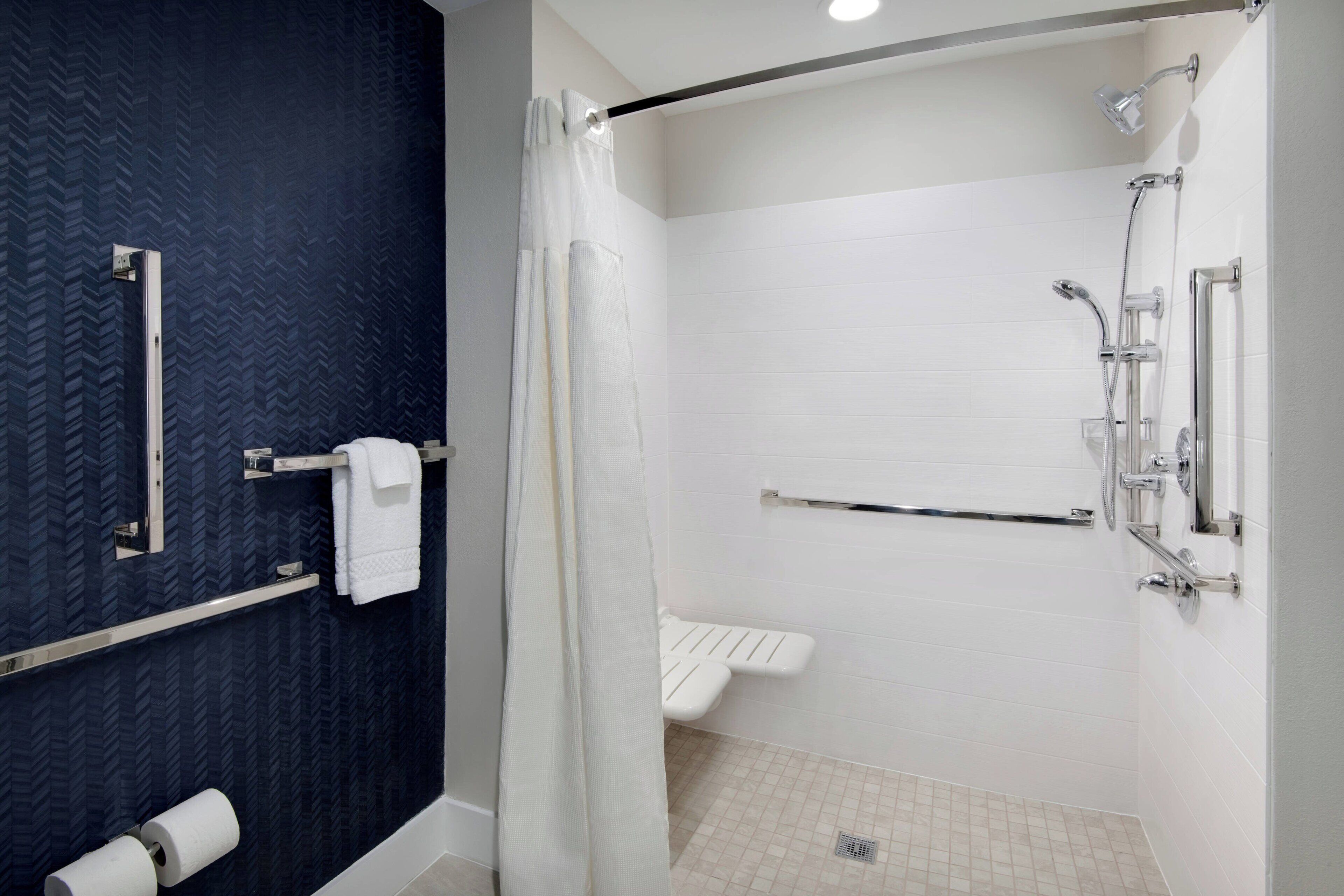 shower, free toiletries, hair dryer, towels