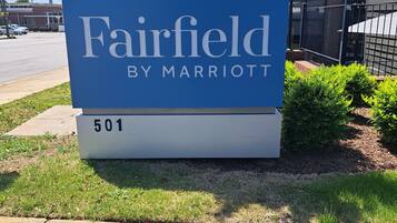 A sign for Fairfield by Marriott with the number 501.