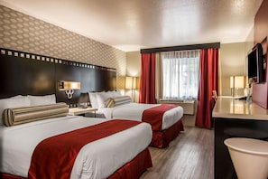 Family Suite, 1 King Bed and 2 Queen Beds, Non Smoking | Down duvets, desk, laptop workspace, blackout curtains