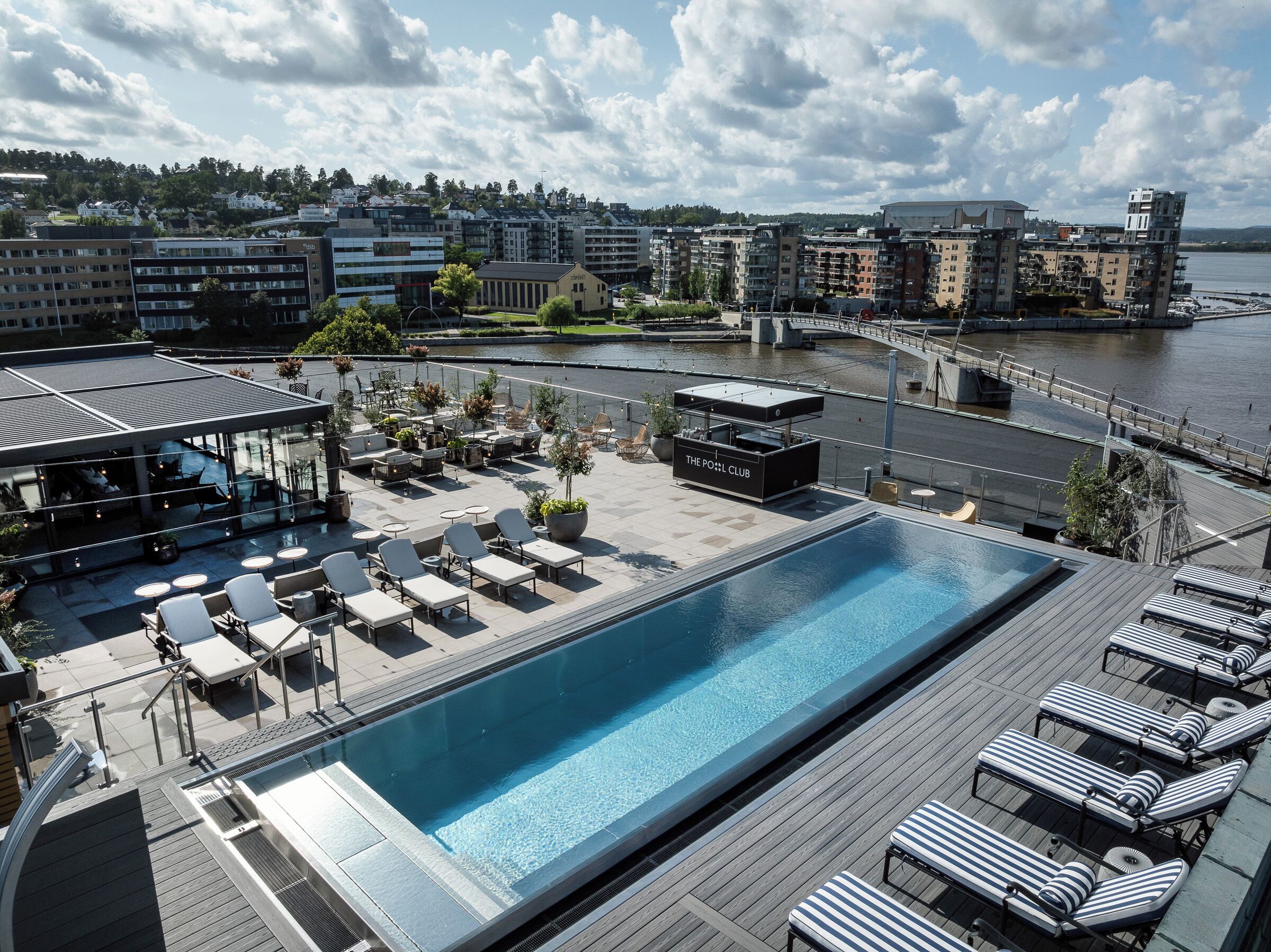 Outdoor pool, open 7:30 AM to 11:00 AM, pool loungers