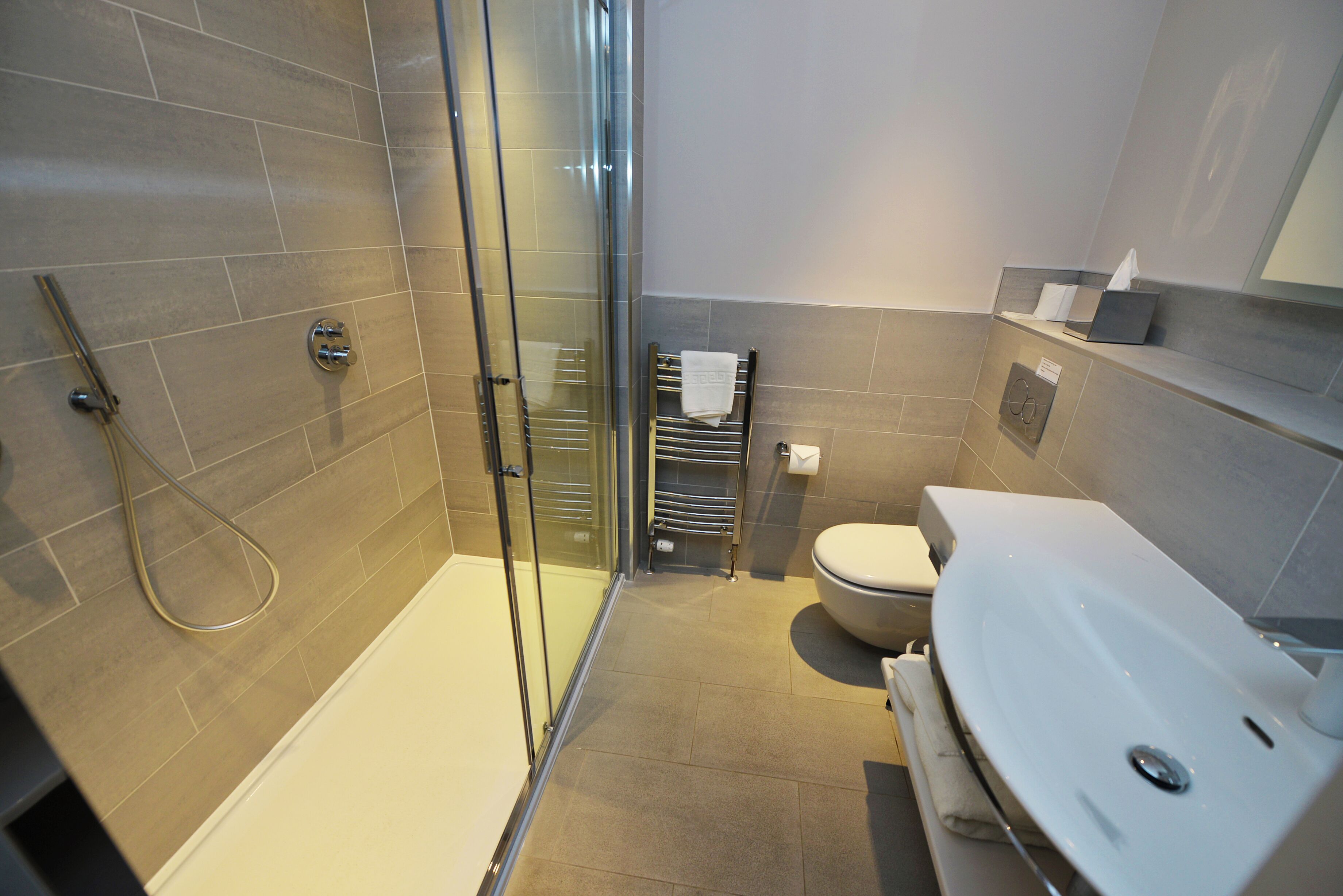 luxury super king | bathroom | designer toiletries, hair dryer, towels