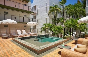 Outdoor pool, open 7:00 AM to 10:00 PM, pool umbrellas, sun loungers at The Balfour Hotel