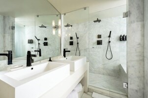 Shower, rainfall showerhead, designer toiletries, hair dryer