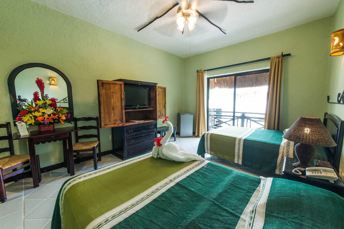 Deluxe Double Street View | Pillow-top beds, in-room safe, blackout curtains, free WiFi
