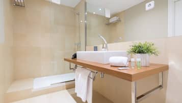 Hair dryer, towels, soap, shampoo