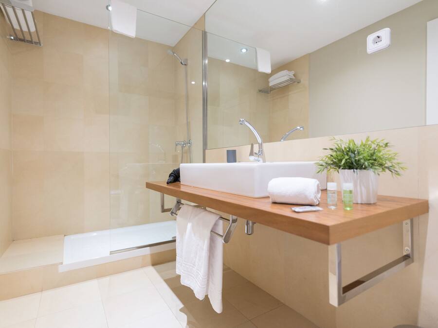 Hair dryer, towels, soap, shampoo