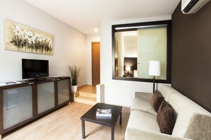 42-inch flat-screen TV with satellite channels