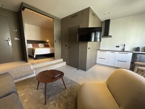 Superior Apartment, 1 Bedroom | Living area | 42-inch flat-screen TV with satellite channels