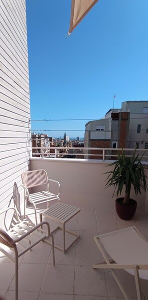 Estudio Confort, terraza, en una planta alta | Terraza o patio