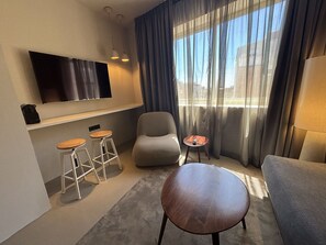 Superior Apartment, 1 Bedroom | Living area | 42-inch flat-screen TV with satellite channels
