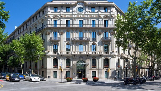 A historic building with a clock tower, multiple balconies, and a grand entrance. - Gran Hotel Havana by Escampa Hotels (Barcelona)