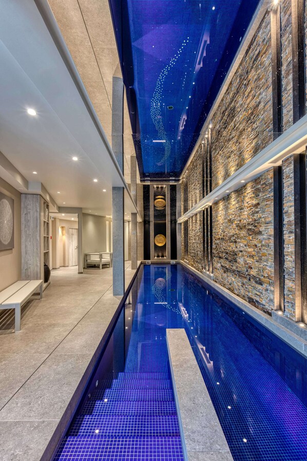 Indoor pool, seasonal outdoor pool, pool umbrellas, sun loungers
