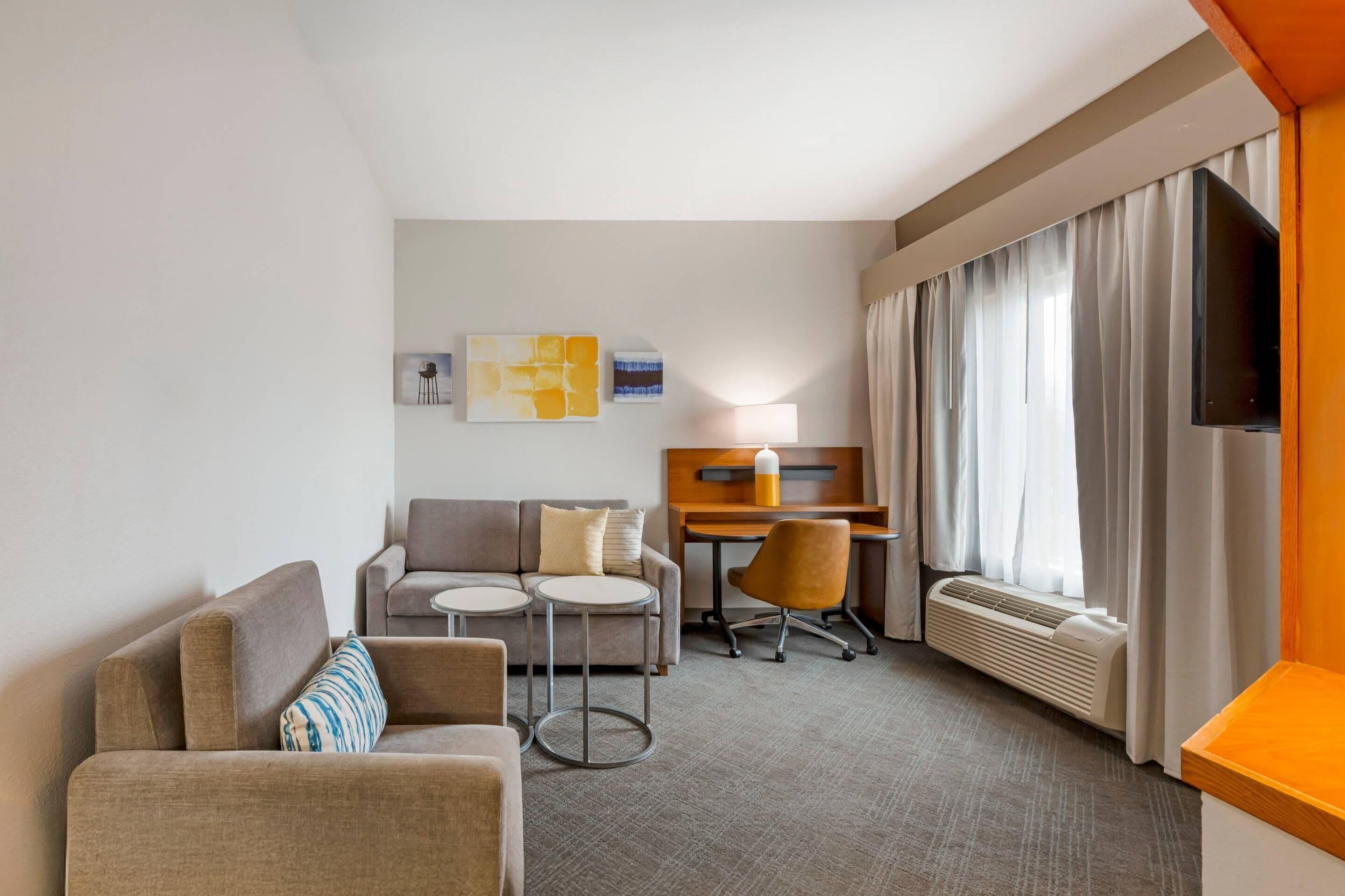 suite, 1 king bed, non smoking | pillow-top beds, individually decorated, individually furnished, desk