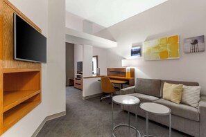 Suite, 1 King Bed, Non Smoking | Pillow-top beds, individually decorated, individually furnished, desk