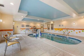 Indoor pool, open 10:00 AM to 9:00 PM, pool loungers