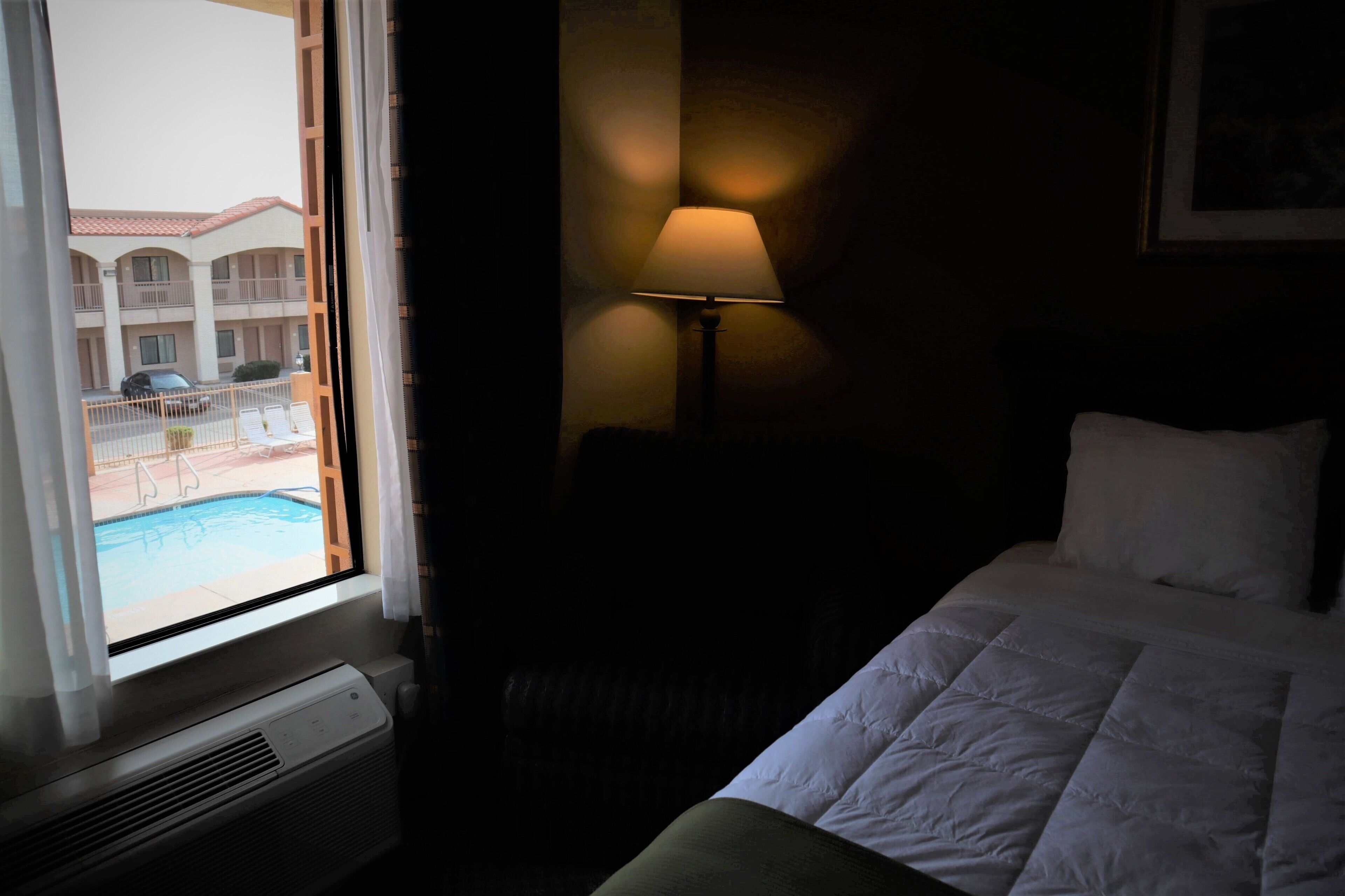 2 queen beds, nonsmoking, upgrade | desk, blackout curtains, iron/ironing board, free wifi