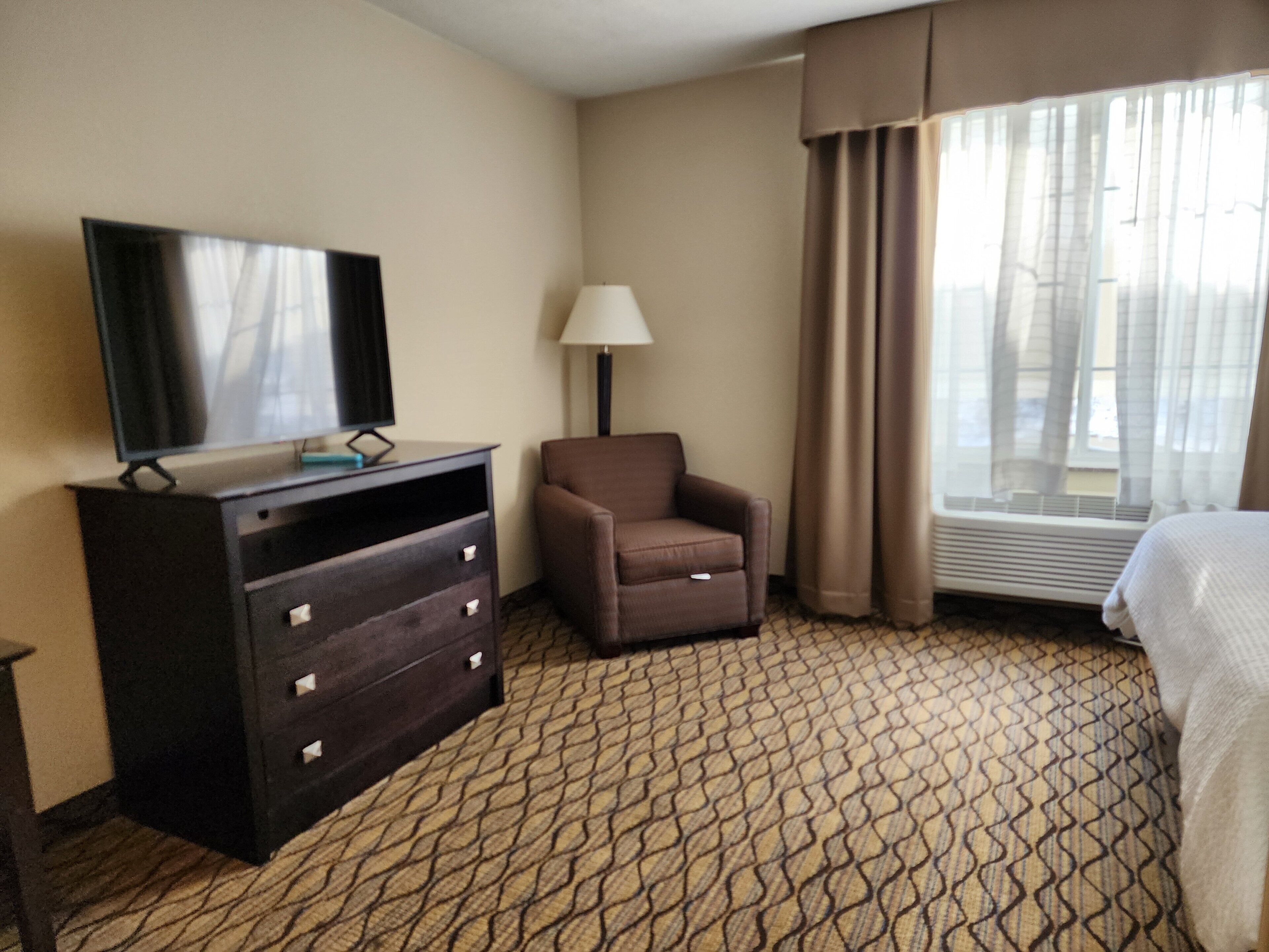 suite, 1 queen bed (additional living area) | in-room safe, desk, laptop workspace, iron/ironing board