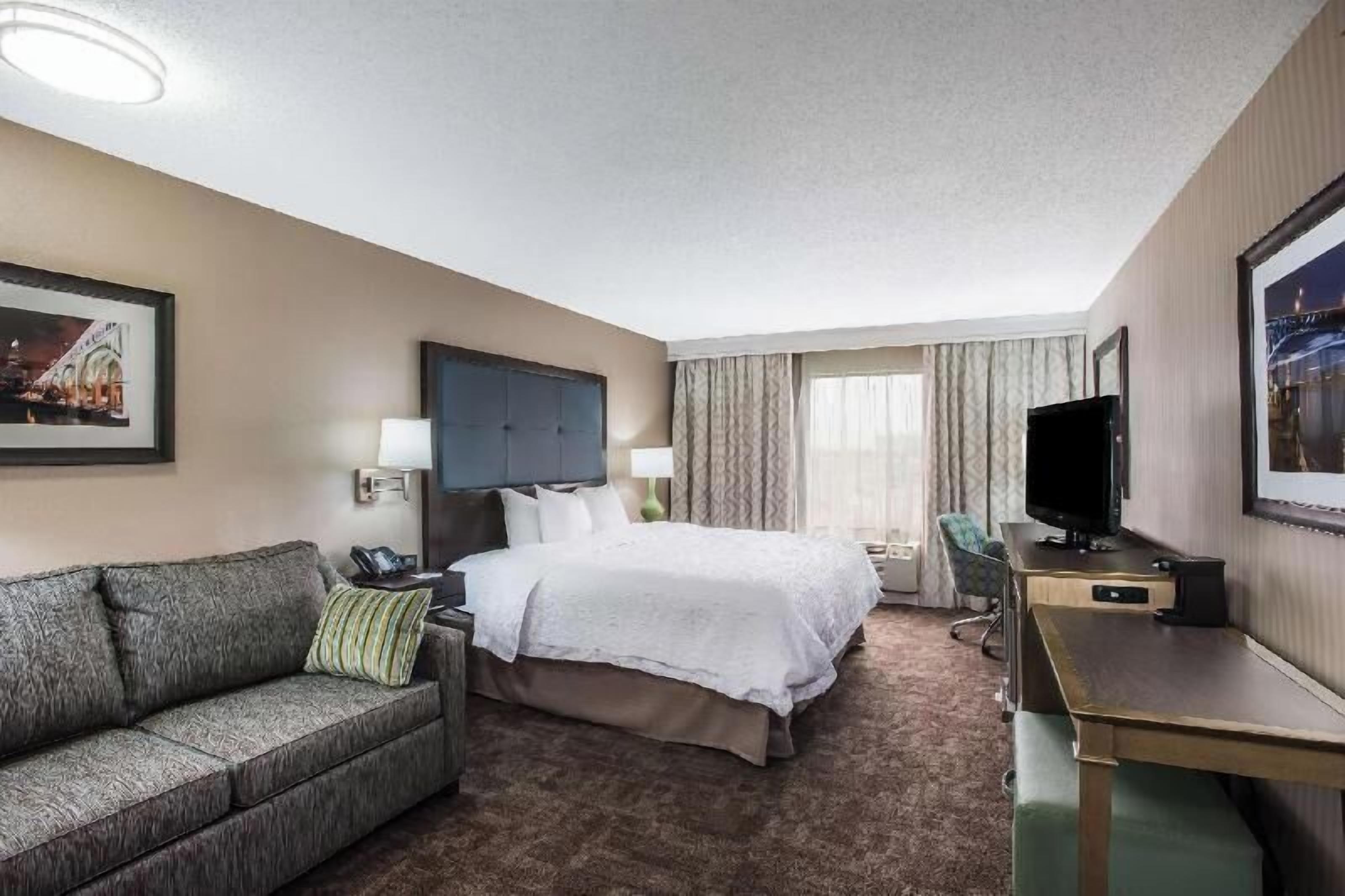 Desk, blackout drapes, iron/ironing board, rollaway beds