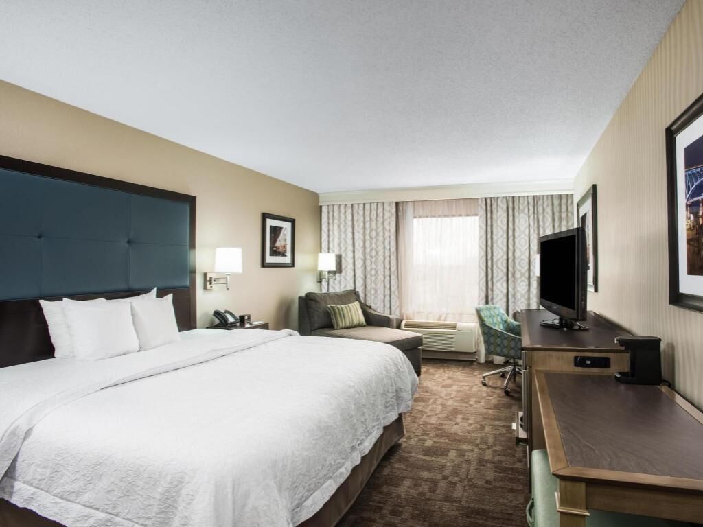 Desk, blackout drapes, iron/ironing board, rollaway beds