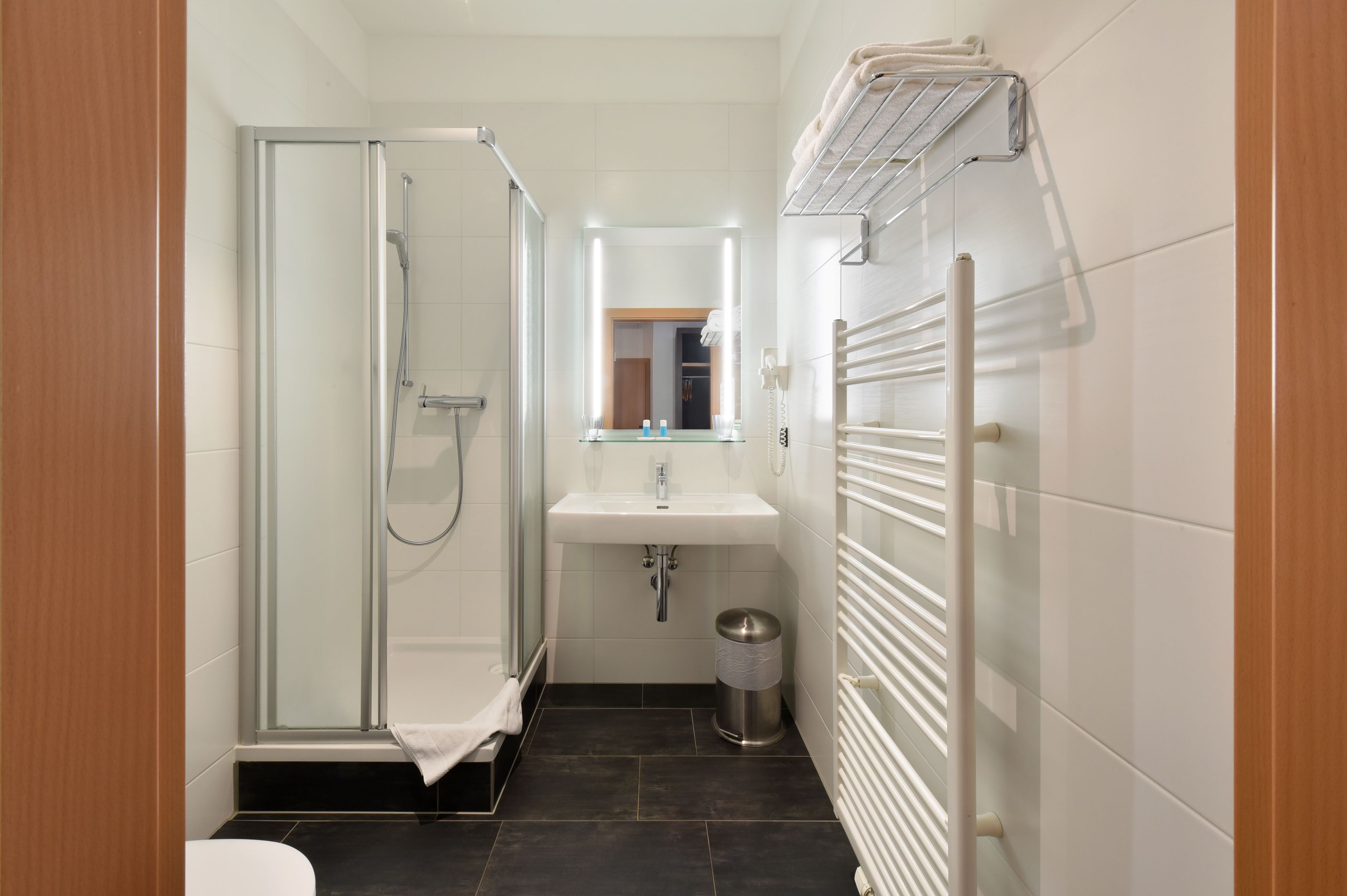 superior double room | bathroom | shower, free toiletries, hair dryer, towels