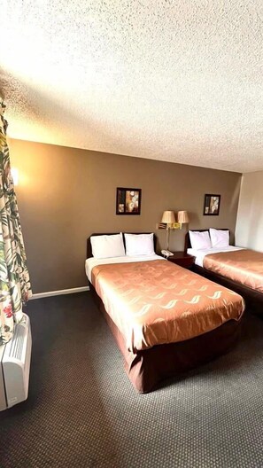 Iron/ironing board, free WiFi, alarm clocks