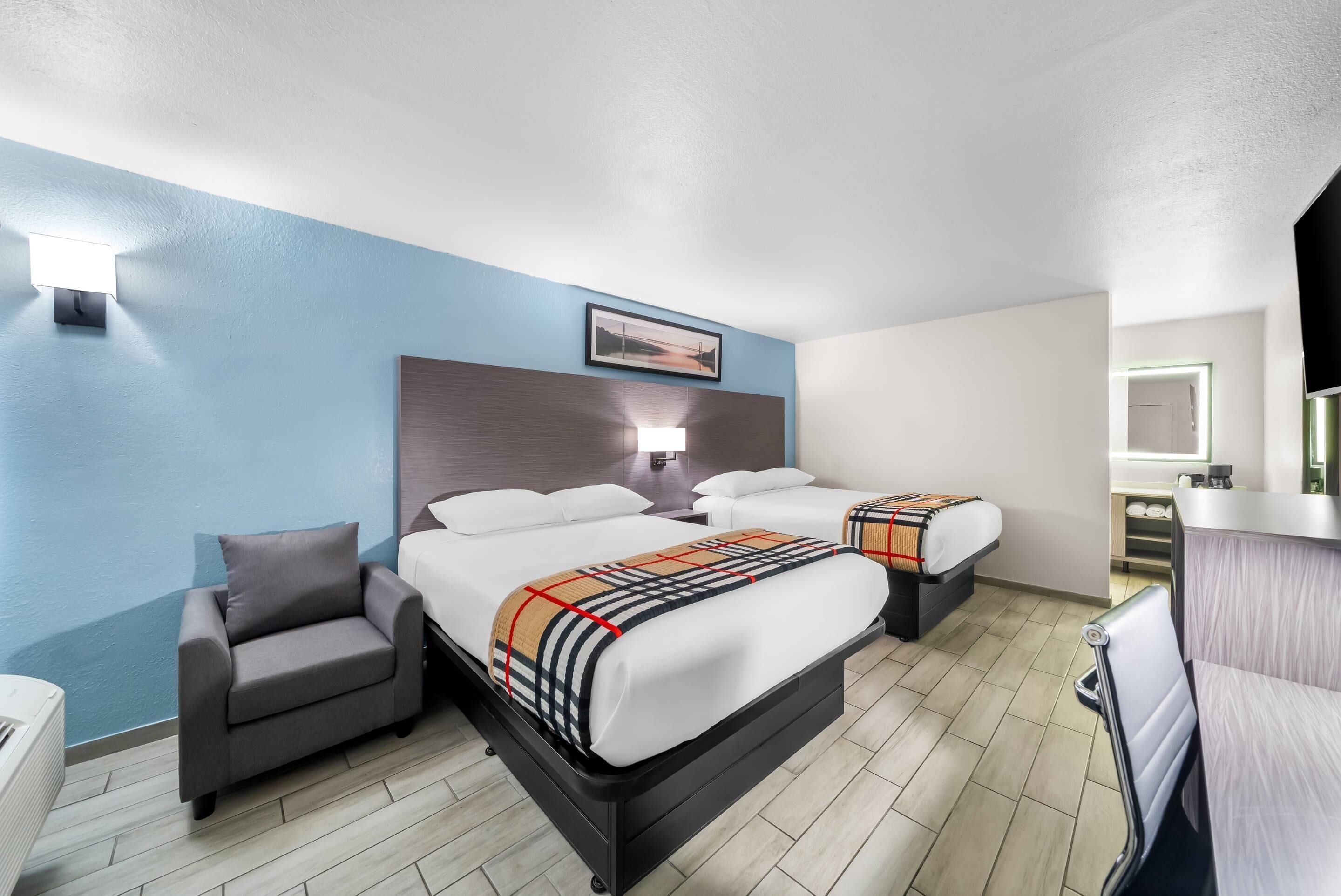 Room, 2 Queen Beds, Non Smoking | Iron/ironing board, rollaway beds, free WiFi, bed sheets