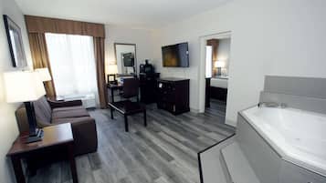 Suite, 1 très grand lit, non-fumeur, baignoire à jets | 1 chambre, literie de qualité, décor unique, ameublement unique