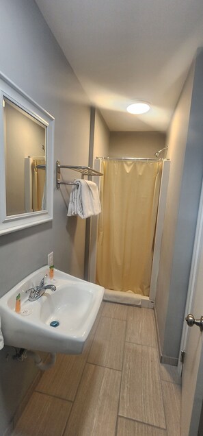 Standard Room | Bathroom | Shower, free toiletries, towels, soap