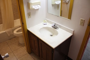 Separate tub and shower, rainfall showerhead, towels, soap