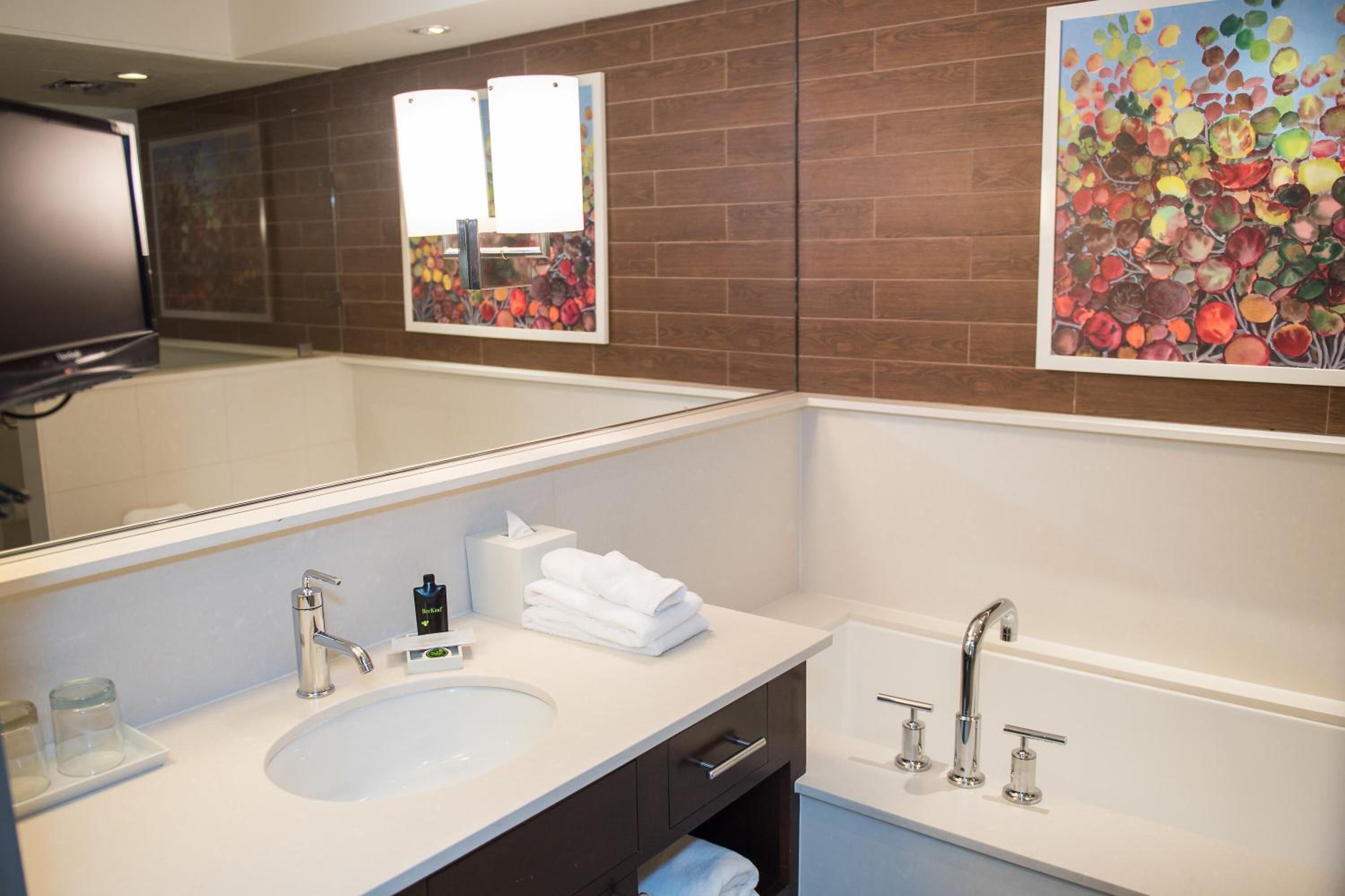 separate bathtub and shower, deep-soaking bathtub, rainfall showerhead